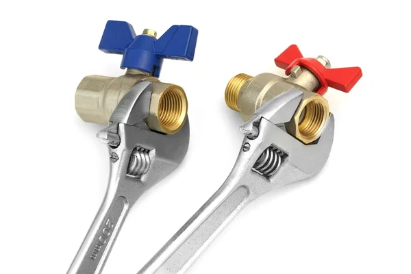 Dos válvulas de bola agarradas con llave ajustable aislada en blanco — Foto de Stock
