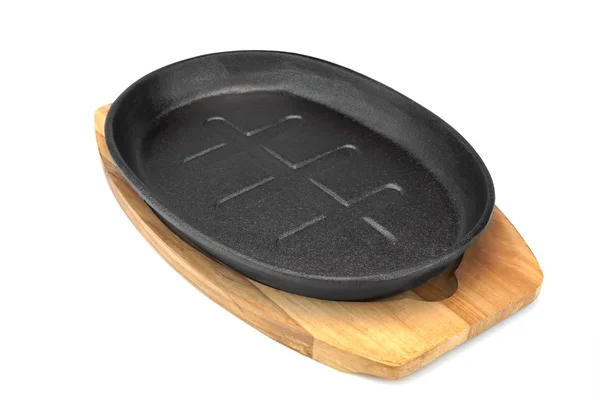 Cast Iron Serving Griddles Pan On Wood Plate White Isolated — Stock Photo, Image