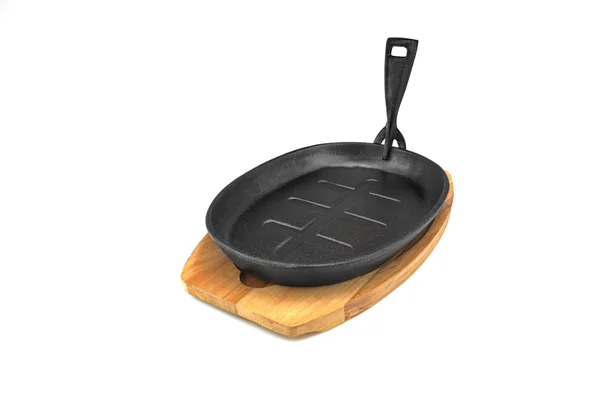 Cast Iron Serving Griddles Pan On Wood Plate White Isolated — Stock Photo, Image