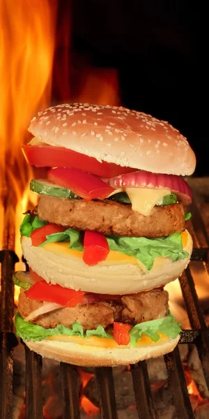 XXL Homemade Cheeseburgers On The BBQ Flaming Grill — Stock Fotó