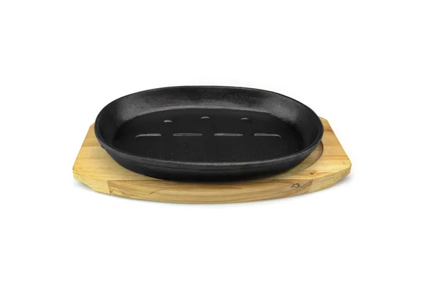 Żeliwo obsługujących Griddles Pan na drewno płyta biały izolowane — Zdjęcie stockowe