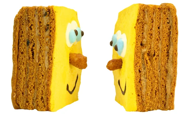 Two Brownie Cake With Human Smiling Yellow Face White Isolated — 图库照片