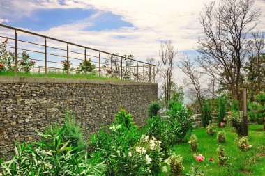 Two Level Garden Terrace  With  Garden And Wall From Gabions clipart
