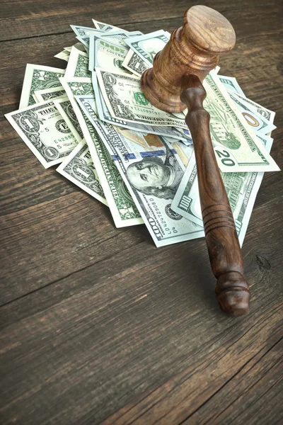 Heap Of Dollars With Judges Or Auctioneers Gavel Or Hammer — Stock Photo, Image