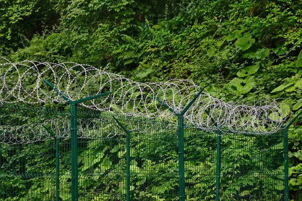 Wire Sectional Fence Panel With PVC Coated And Barb Razor Wire With Central Reinforcement.  Secur Perimeter Fencing At Privacy Area