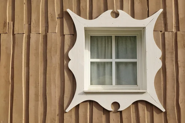 Wooden Overlapped Boarded Wall Background With Single Window And Carved White Plat Band — Stock Image Wooden Overlapped Boarded Wall Background Single Window Carved White Plat Royalty Free Stock Photos