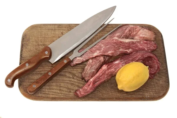 Raw Skirt Steak Tenderloin Beef Steak Knife Fork Cutting Board — стокове фото