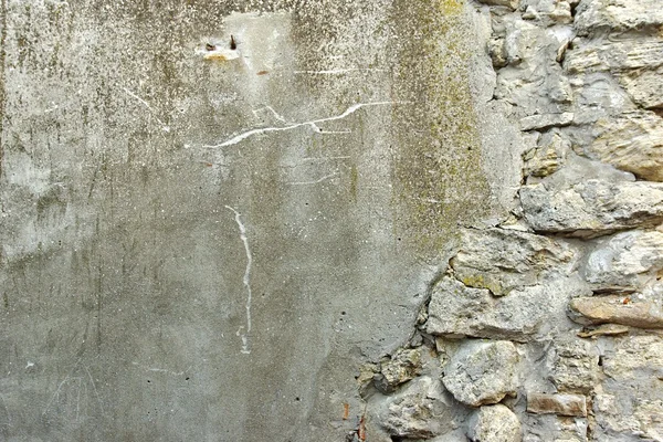 Muur met beschadigde gips — Stockfoto