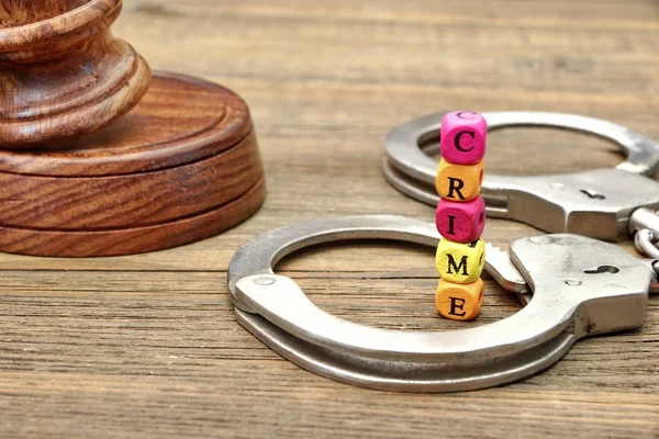 Judges Gavel, Soundboard,  Handcuffs and Sign CRIME — Stock Photo, Image