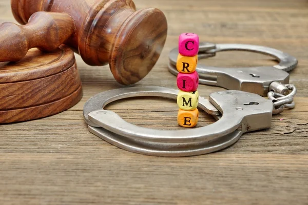 Judges Gavel, Soundboard,  Handcuffs and Sign CRIME — Stock Photo, Image