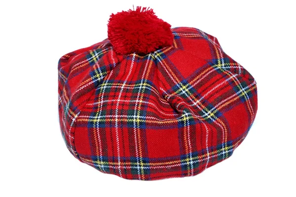 Traditionelle schottische rote Tartanmütze. — Stockfoto