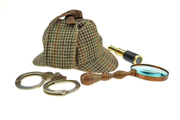 Deerstalker Hat, Magnifier, Handcuffs and Spyglass — Zdjęcie stockowe