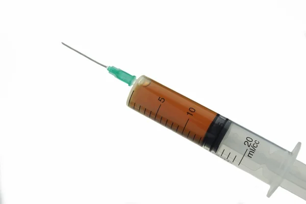 Medical Syringe With Brown Liquid Solution — Stock Photo, Image