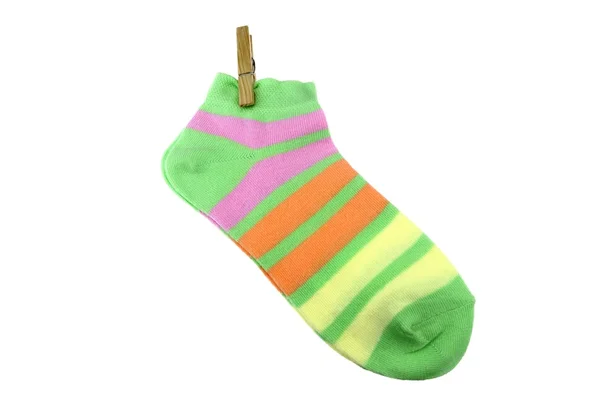 Paar grün, orange, gelb und violett gestreifte Damensocken mit — Stockfoto