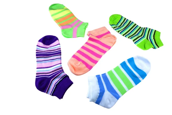 Muchos pares coloridos calcetines a rayas aislados en blanco —  Fotos de Stock