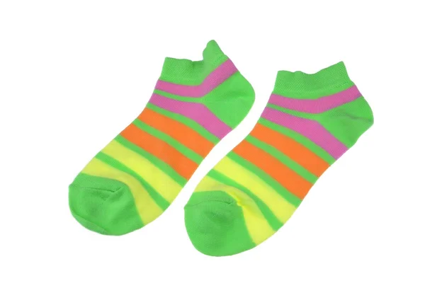 Pár zöld, narancssárga, sárga és lila csíkos női zokni — Stock Fotó