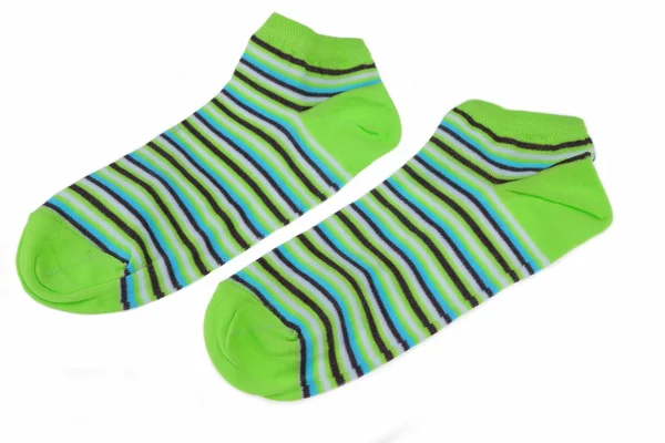 Pár zöld, fekete, kék és fehér csíkos női zokni — Stock Fotó