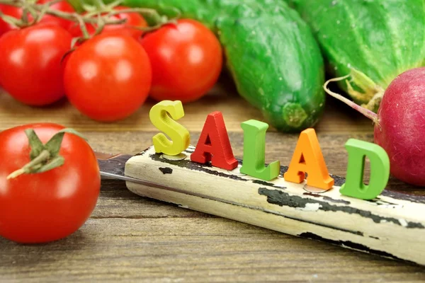 Sign Salad Made From Wood Letters And Fresh Local Vegetables — Stock Photo, Image