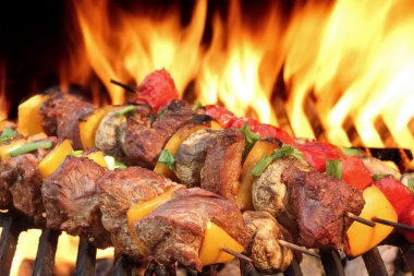 Barbecue Beef Kababs On The Hot Grill Close-up clipart