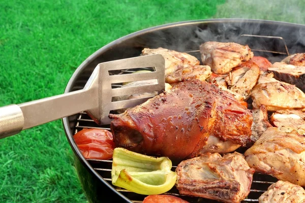 BBQ Assorted Meat And Vegetables On The Hot Flaming Grill