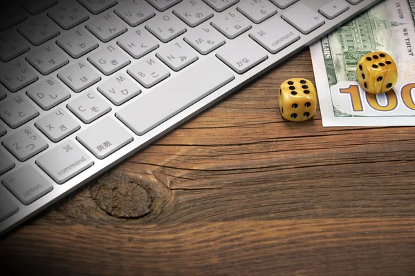 Computer Keyboard, Gaming Dices And Dollar Cash On Wood Backgrou — Stock Photo, Image