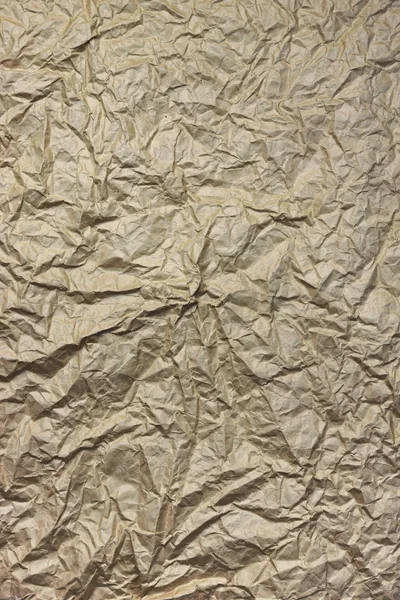 Μεγέθυνση του ακατέργαστων Brown τσαλακωμένο υφή τετράγωνο χαρτί συσκευασίας — Φωτογραφία Αρχείου