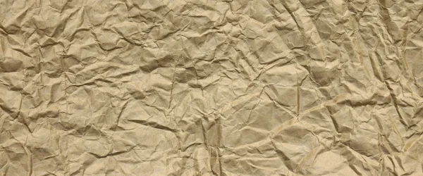 Close-up Of Rough Golden Brown Wrinkled Packaging Paper Texture — Stock Photo, Image