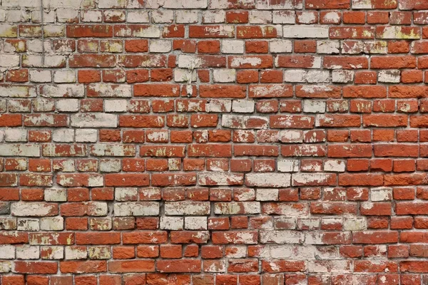 Trasiga gamla bricklayingen från rött vitt tegel och skadade gips — Stockfoto