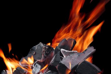 Hot Glowing Charcoal With Bright Flames In The Dark Close-up clipart