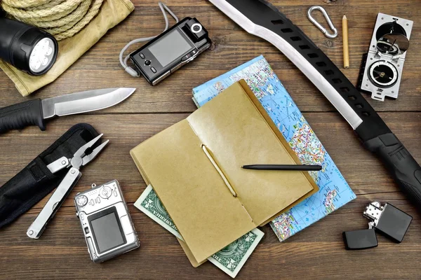 Survival Kit Laid Out On The Wood Floor — Stock Photo, Image