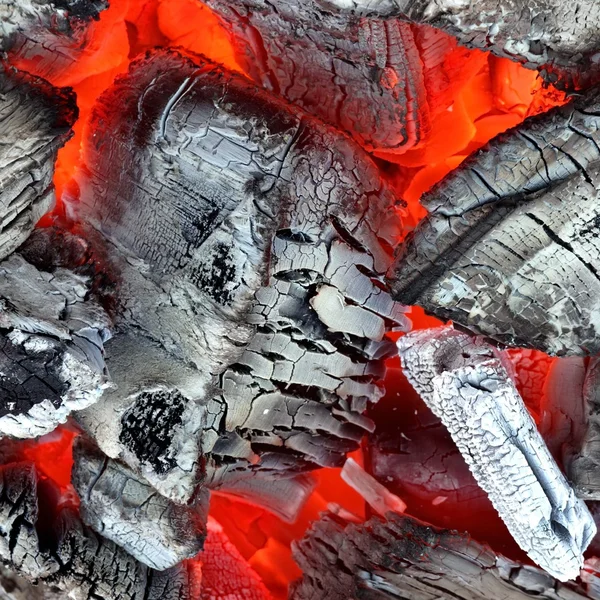 Žhnoucí horké uhlí pozadí textury — Stock fotografie