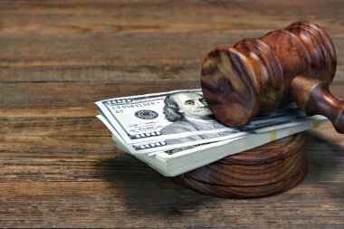 Judges Gavel, Soundboard And Bundle Of Money On The Table clipart