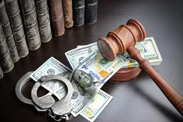 Judges Gavel, Handcuffs, Dollar Cash And Book On  Black Table — Zdjęcie stockowe