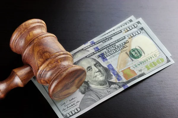 Judges Gavel And Dollar Cash  On The Black Table — Zdjęcie stockowe