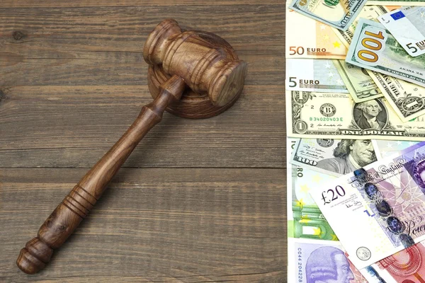 Judges Or Auctioneers Gavel, Dollars, Euro, Pounds On Wood Table — 图库照片
