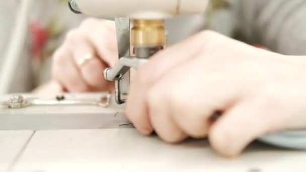 Close Girl Works Sewing Workshop Electric Sewing Machine Sews Clothes — Stock Video