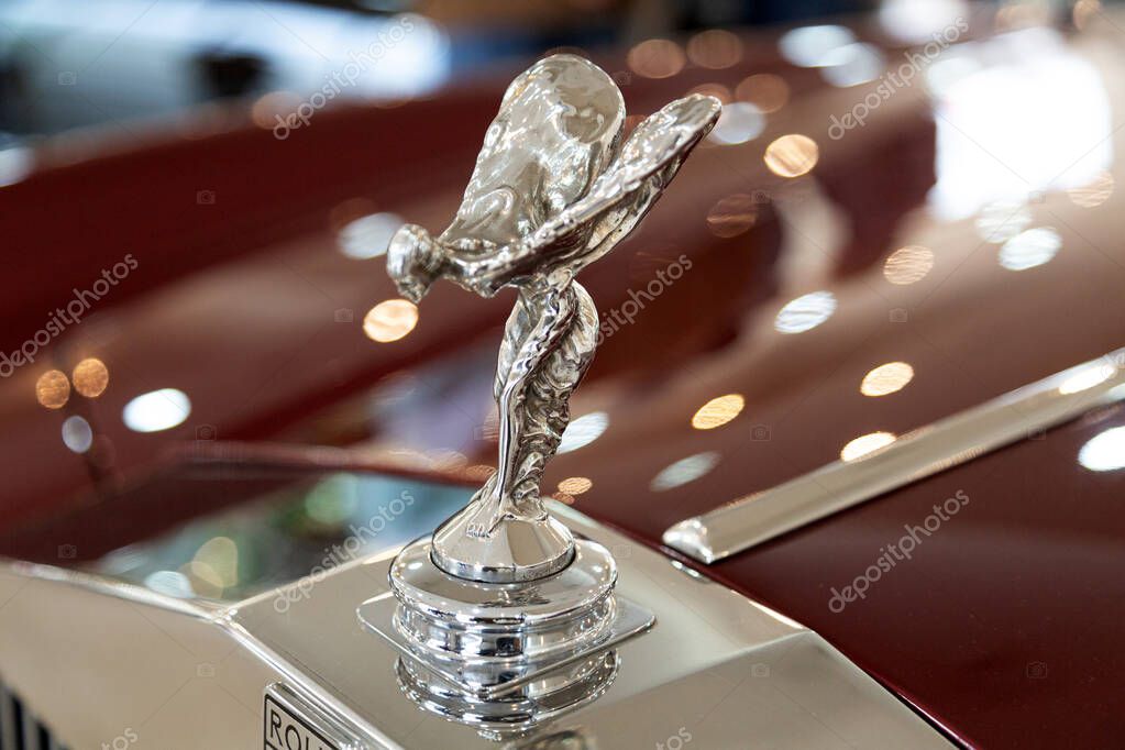 The Spirit of Ecstasy Rolls Royce badge, emblem on vintage hood, Portugal, Porto, October 04, 2025