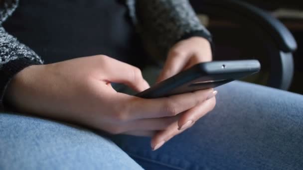 Woman using smartphone for messaging chat on a smartphone,social network tech addiction — Stock Video