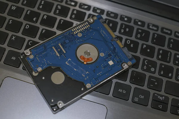 Hdd memory storage device over dark surface,tech components,data security parts