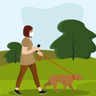 Kadın köpek gezdirir.