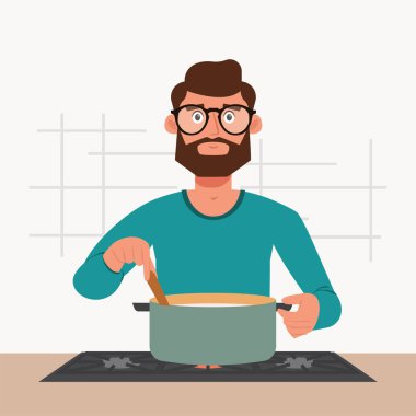 Adam yemek yapıyor. Hygge konsepti