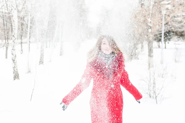 Pretty young girl with snow — Stock Photo, Image