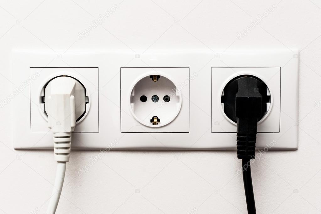 Triple electrical socket with two plugged cable