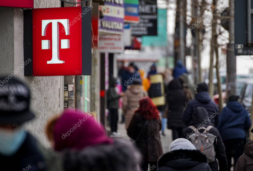 Bucharest, Romania -  February 16, 2021: A logo of Telekom, German telecommunications company, is displayed on top of a store, in Bucharest, Romania.