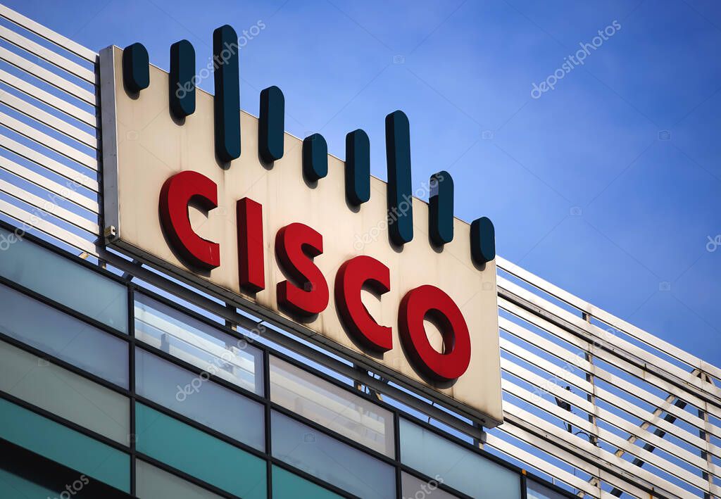 Bucharest, Romania - February 24, 2021: The Cisco Systems logo is seen on the top of a building, in Bucharest, Romania.