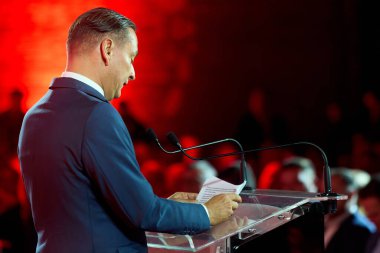 Bucharest, Romania. 19th Nov, 2025: Daniel Baluta, mayor of Sector 4, reads his speech during the launch of his candidacy for general mayor of Bucharest.