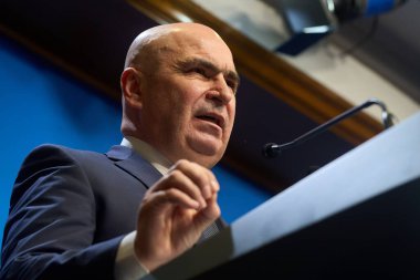 Bucharest, Romania. 21st Nov, 2025: Ilie Bolojan, Prime Minister of Romania, holds a press conference at Victoria Palace, the Romanian Government headquarters.