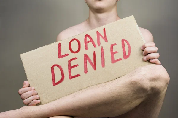 Man holding a sign loan is denied — Stock Photo, Image