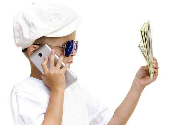 Boy looking at the dollars — Stock Photo, Image