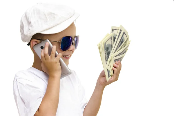 Boy looking at the dollars — Stock Photo, Image